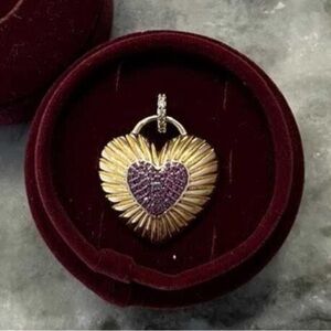 Hillberg and Berk “Aura Heart charm”. Gold tone with burgandy accents